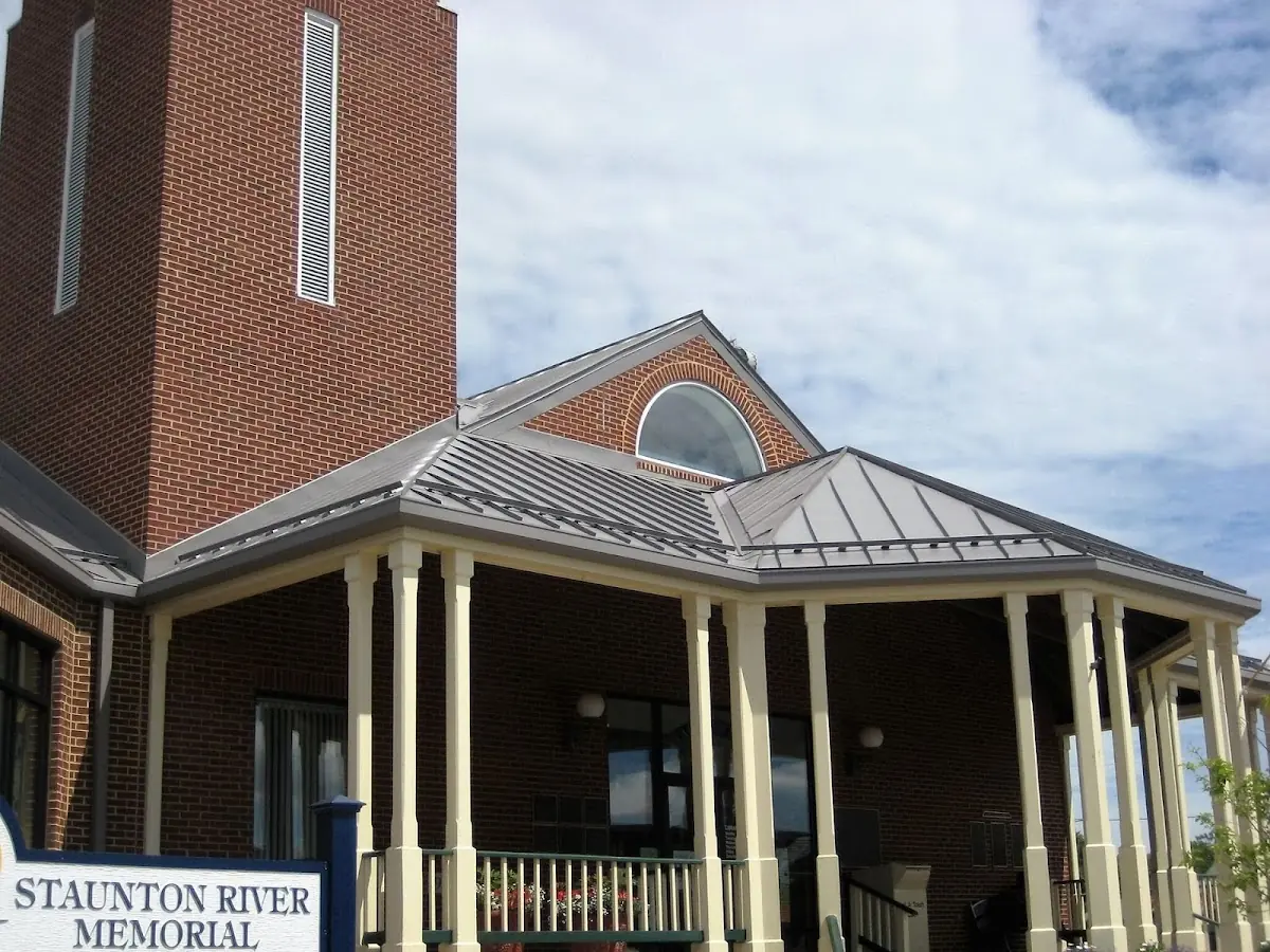 Skilled roofing craftsmen working on a residential roof in Lower Dutchtown